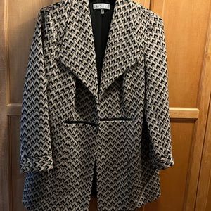 Suit coat. Beautiful. Lightweight. Has some stretch. Worn once. Zipper detail.